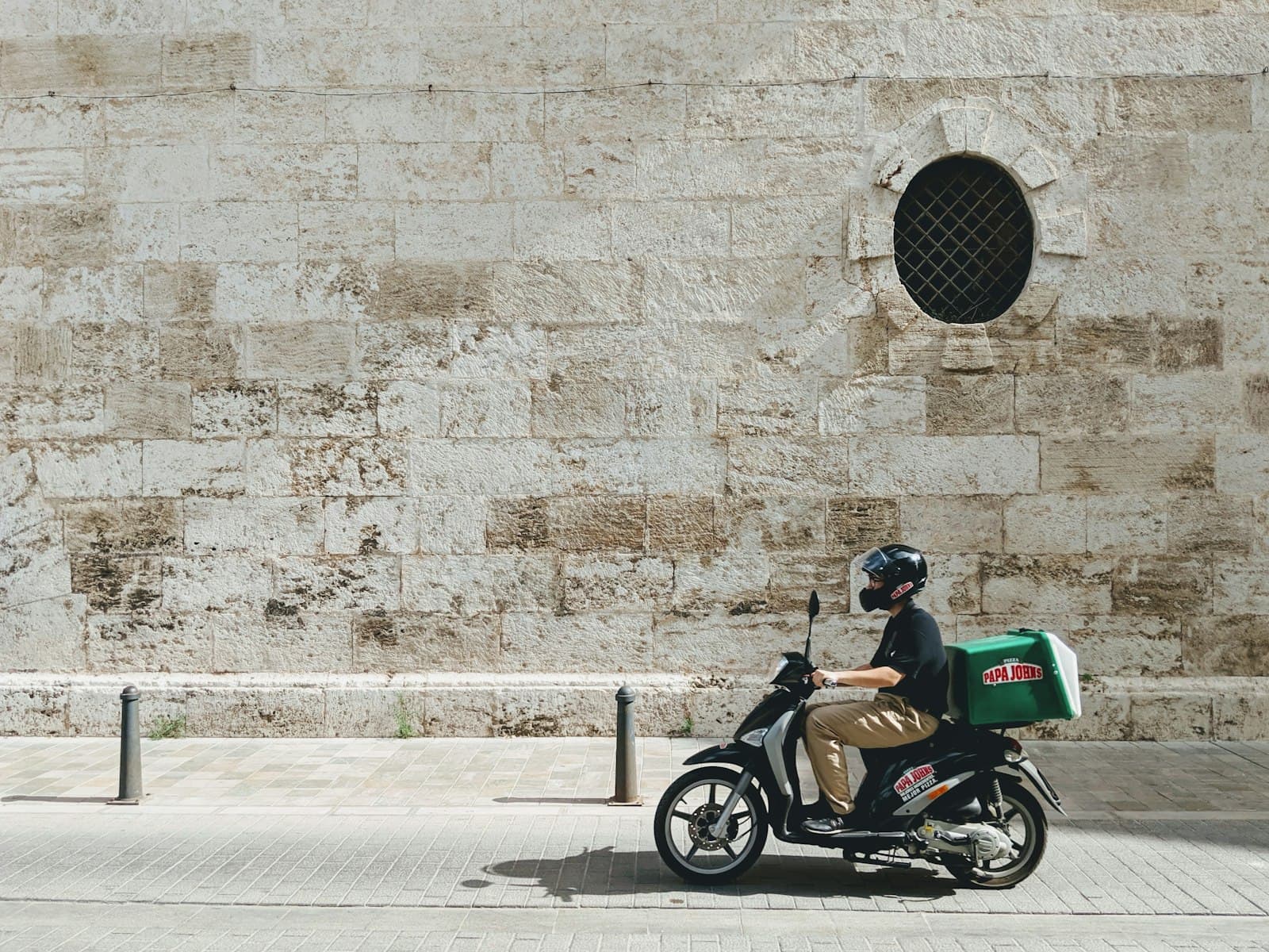 Delivery rider on a scooter