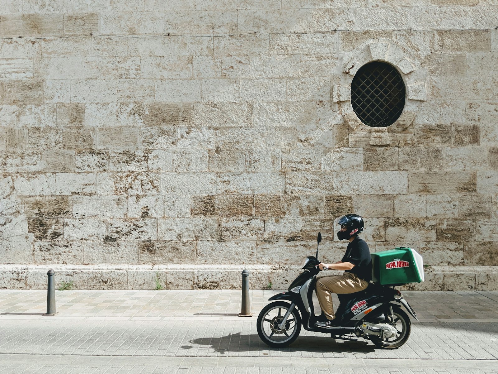 Delivery rider on a scooter